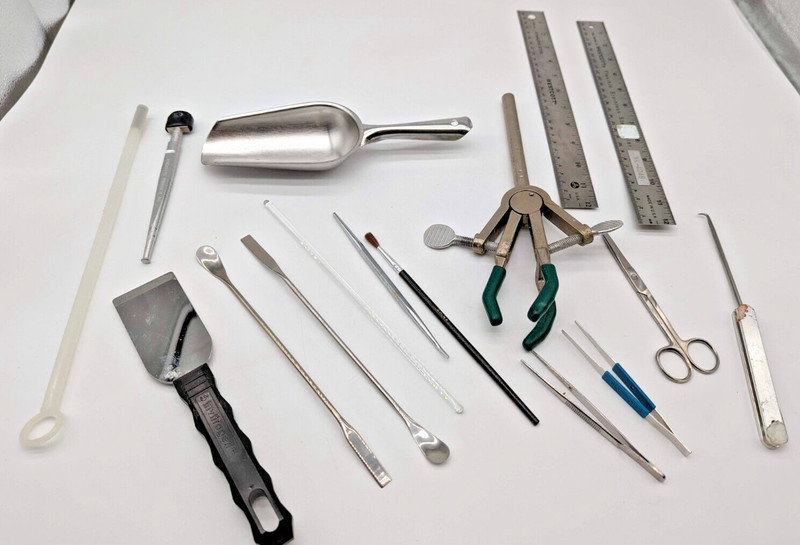 Large lot of miscellaneous laboratory tools, spatulas, clamps, tweezers, etc.